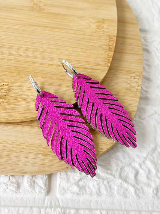 Caravanas de Acero Quirúrgico y Cuero