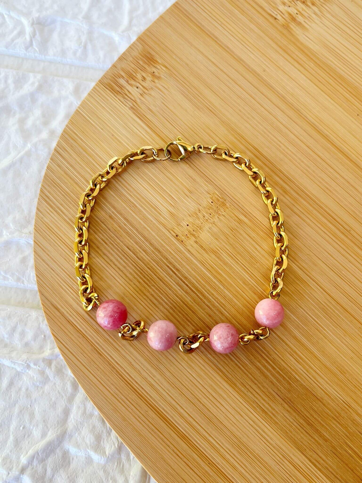 Pulsera de Acero Dorado y Piedra Natural Rodocrosita
