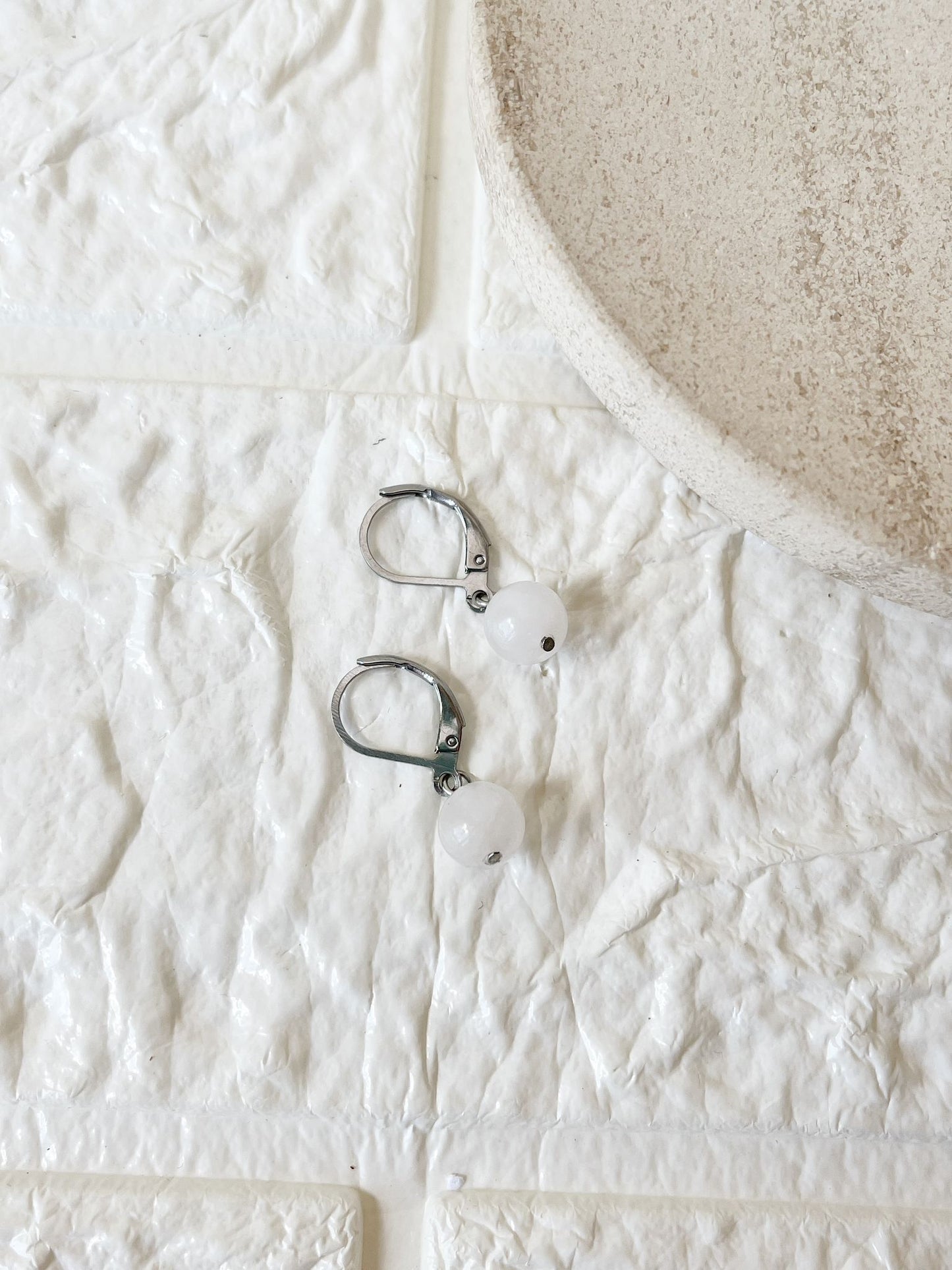 Caravanas de Cuarzo Blanco y Acero Quirúrgico