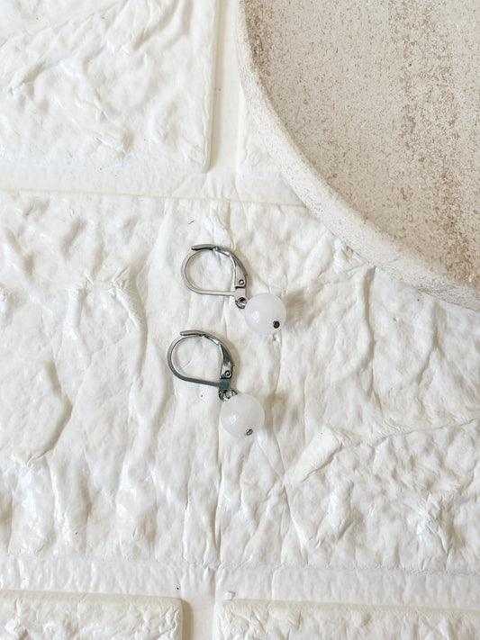 Caravanas de Cuarzo Blanco y Acero Quirúrgico