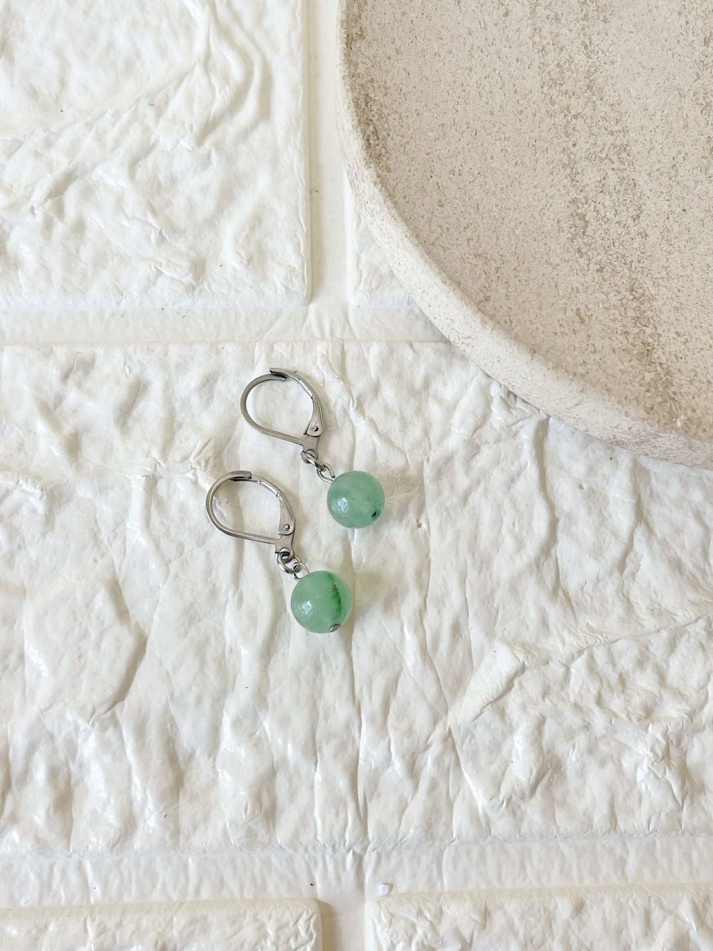 Caravanas de Cuarzo Verde y Acero Quirúrgico