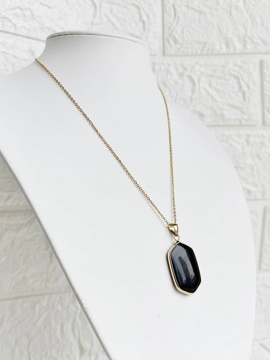 Conjunto de Acero Dorado y Piedra Natural Ónix