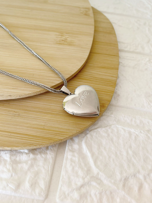 Conjunto Relicario de Acero Quirúrgico