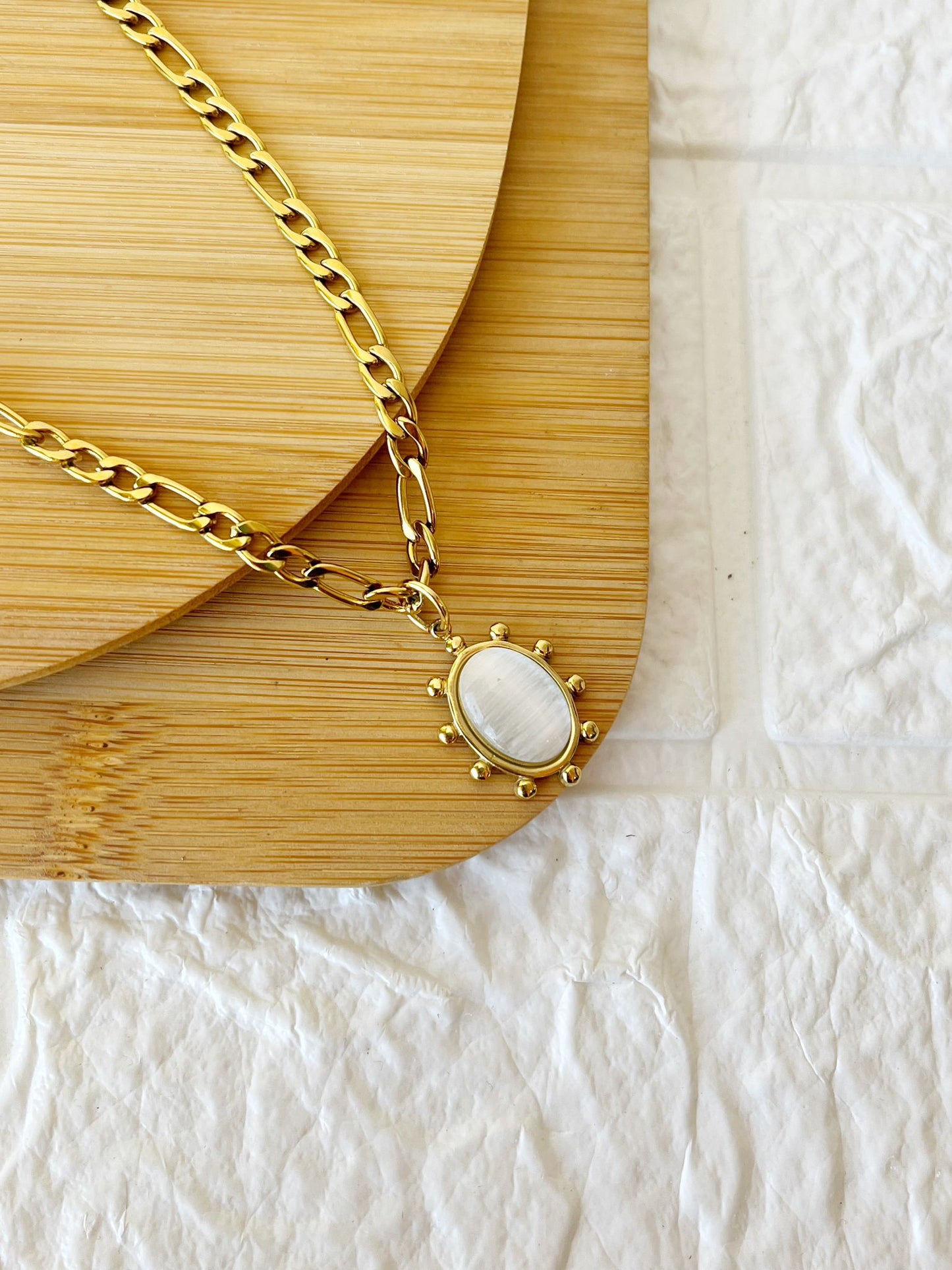 Conjunto de Acero Dorado. Piedra ojo de Gato