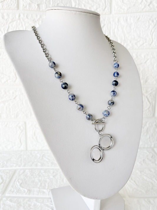 Conjunto Relicario de Acero Quirúrgico y Piedras Naturales Cuarzo Azul