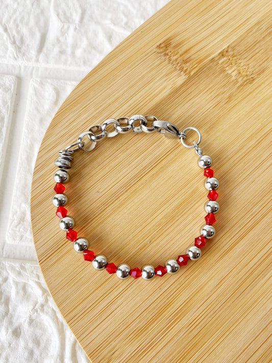 Pulsera de Cristales Facetados y Acero Quirúrgico