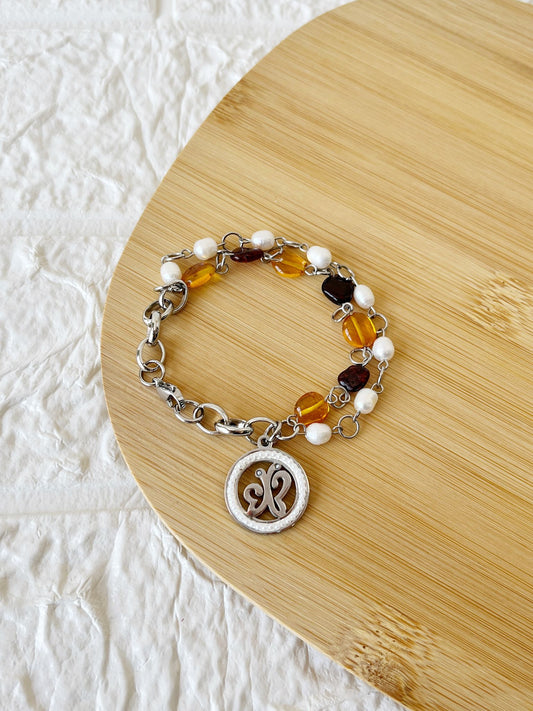 Pulsera de Ámbar, Perlas de Río y Acero Quirúrgico