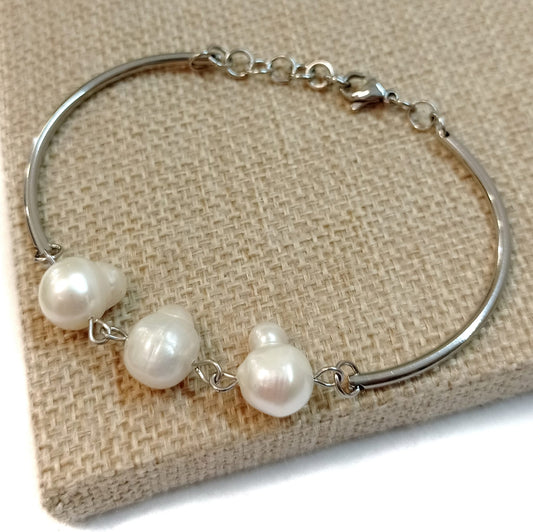 Pulsera de Perlas de Río y Acero Quirúrgico